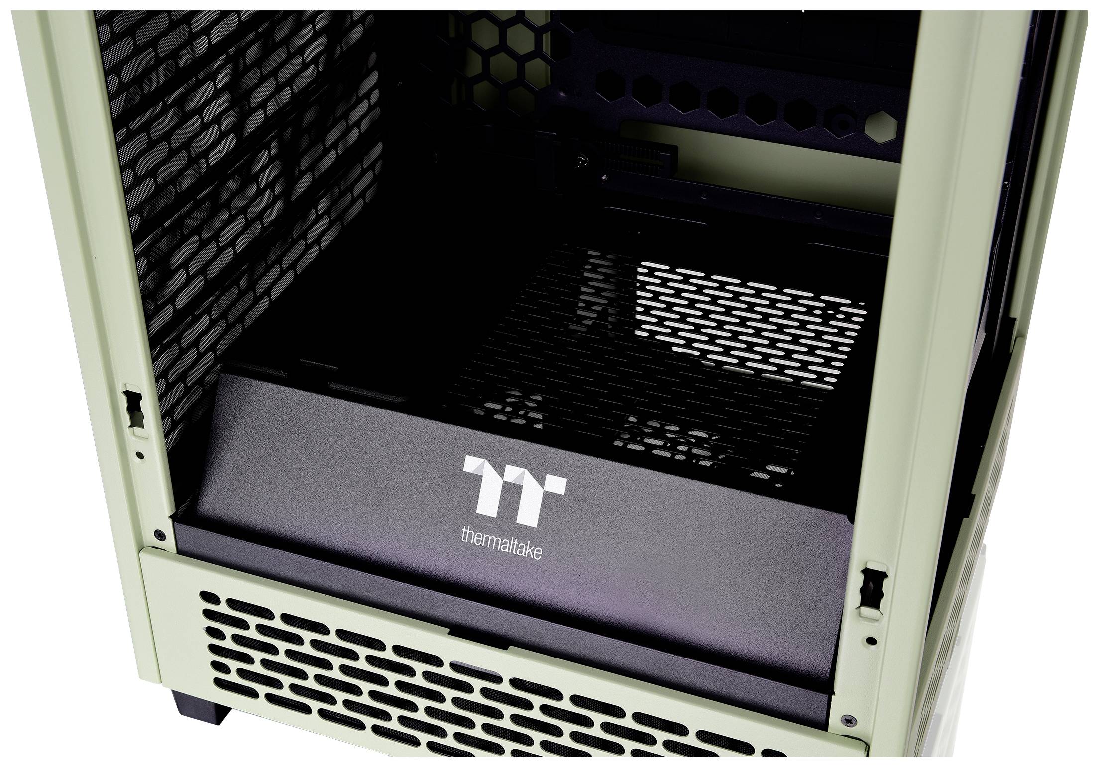 A computer case with an open side panel reveals its interior. The brand name 'Thermaltake' is visible on a cover.