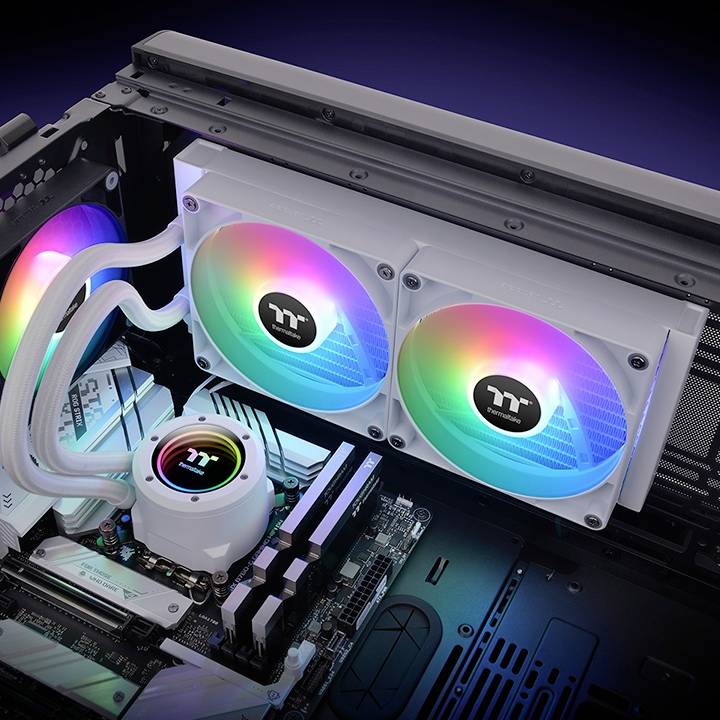 A PC case with an open side panel reveals illuminated fans and water cooling with RGB LEDs, mounted on a motherboard.