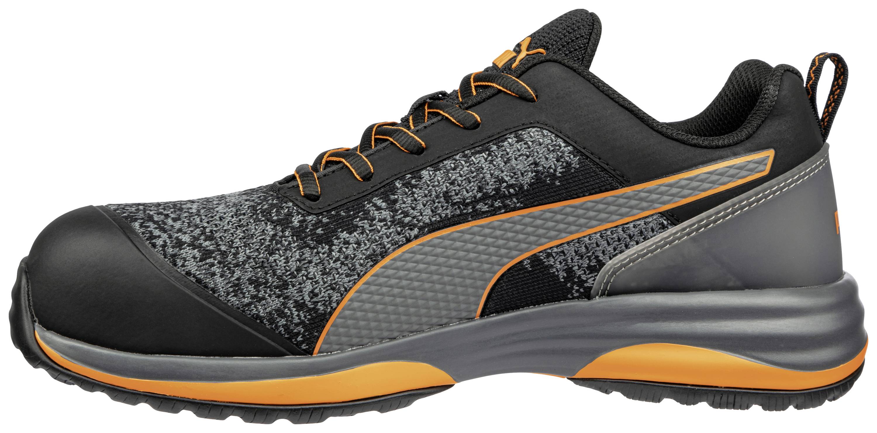 Black and grey sports trainer with orange accents, viewed from the side.
