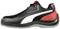 Black sports shoe with red and white accents, side view.