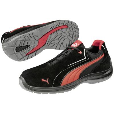Black sports shoe with red Puma logo and red accents, side view with sole profile visible.