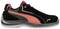 Black sports trainer with a red stripe and logo on the side, suitable for sporting activities or everyday wear.