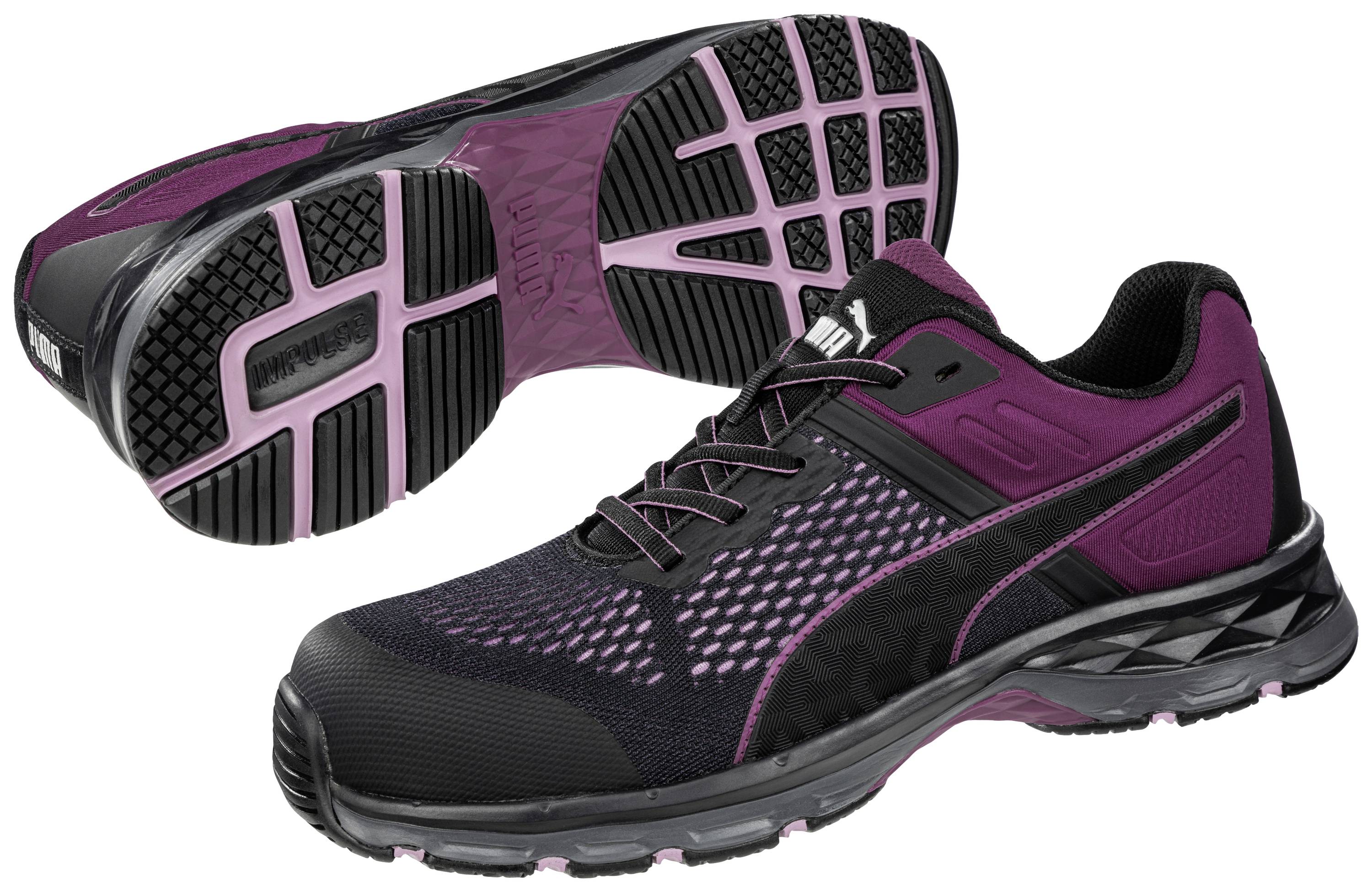 A pair of black and purple sports trainers with a non-slip sole. The shoes are designed in a modern style and are suitable for sporting activities.
