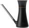 A black watering can with a sleek design, a transparent handle with a measuring scale and an orange accent.