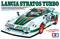 Model kit illustration: Lancia Stratos Turbo with Alitalia sponsorship. Front view, distinctive aerodynamics, dynamic design.