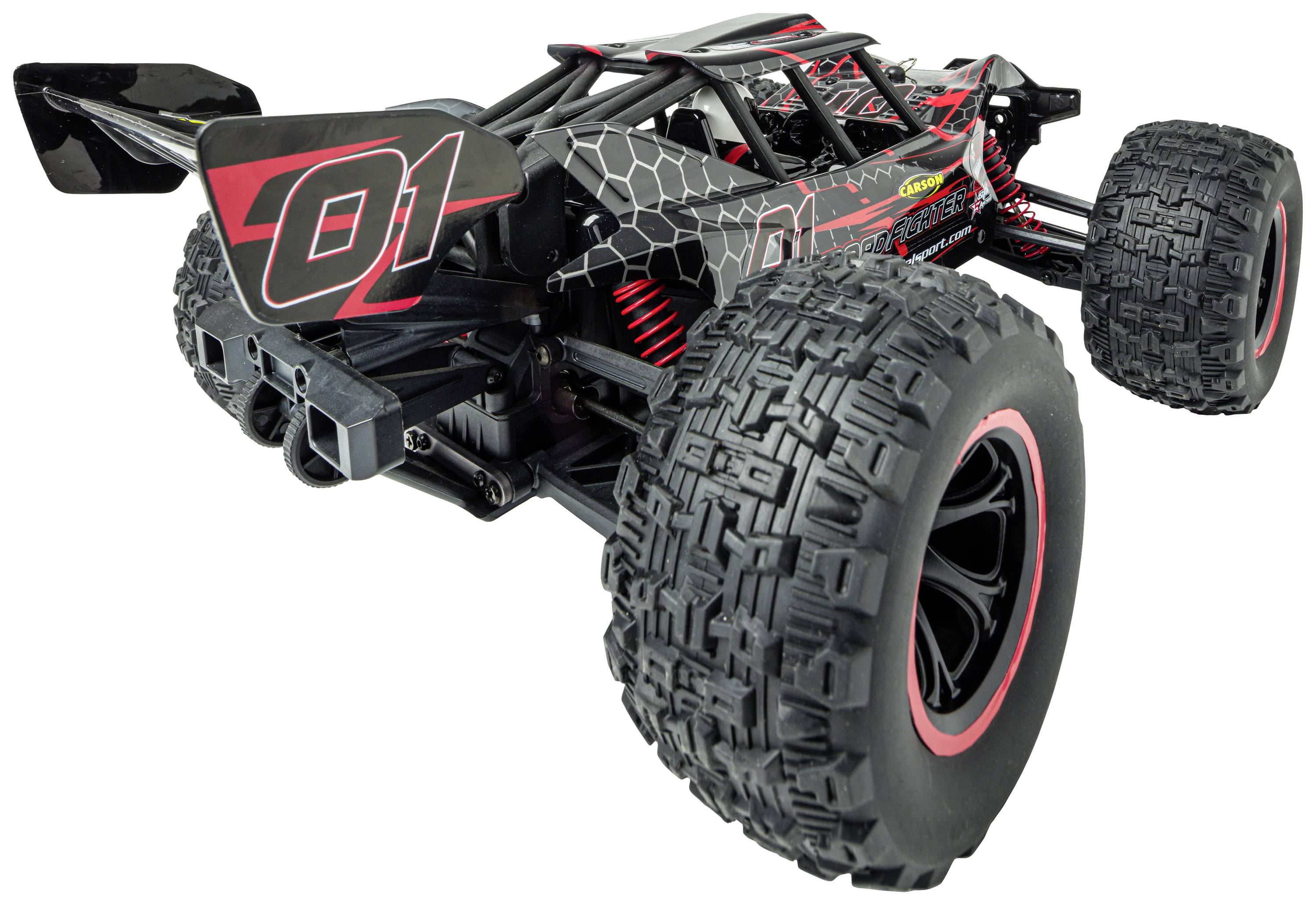 A remote-controlled car with large, structured tyres and a distinctive '01' design on the bodywork in black and red.