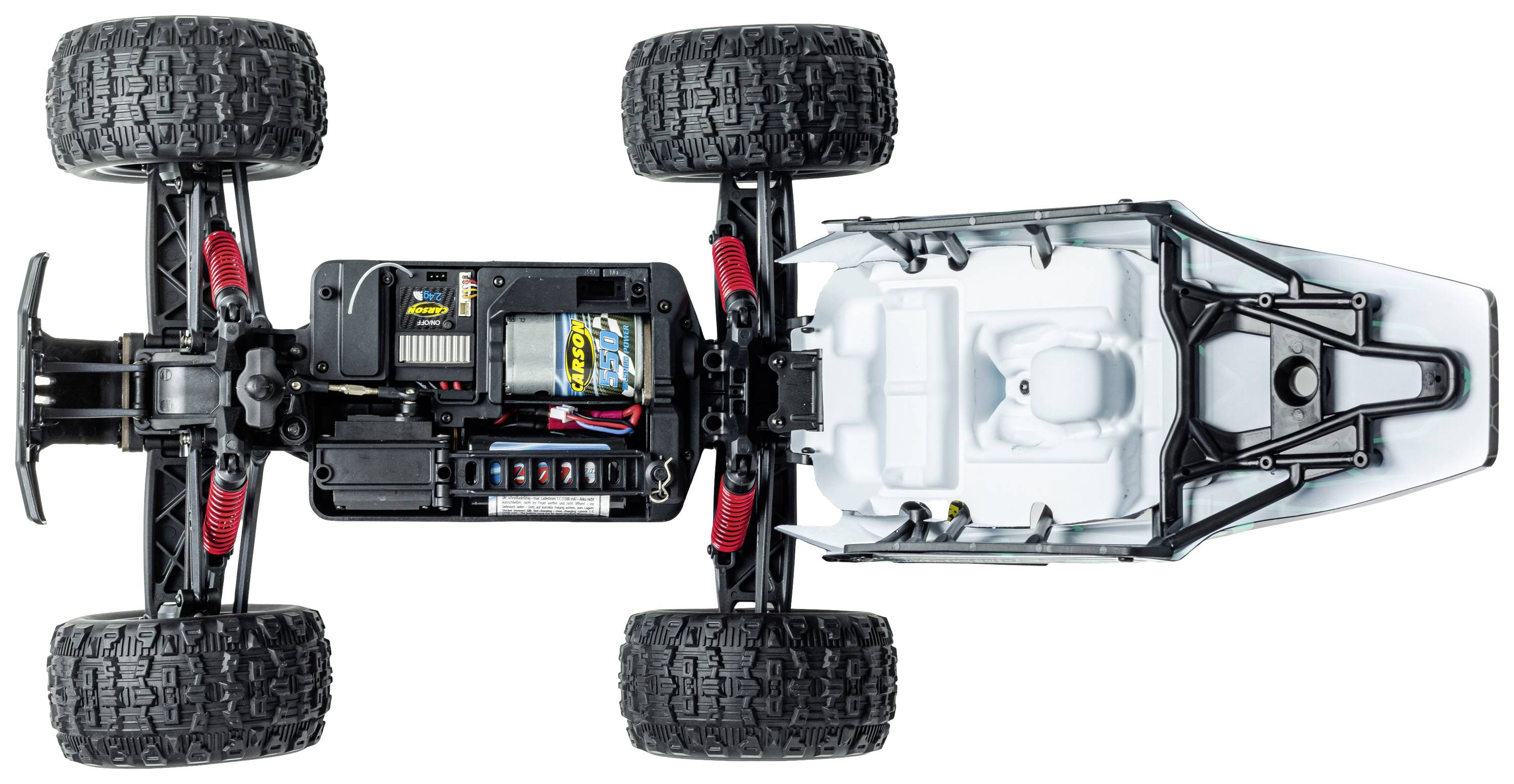 Remote-controlled model car viewed from underneath. The tyres, motor, and battery compartment are visible.
