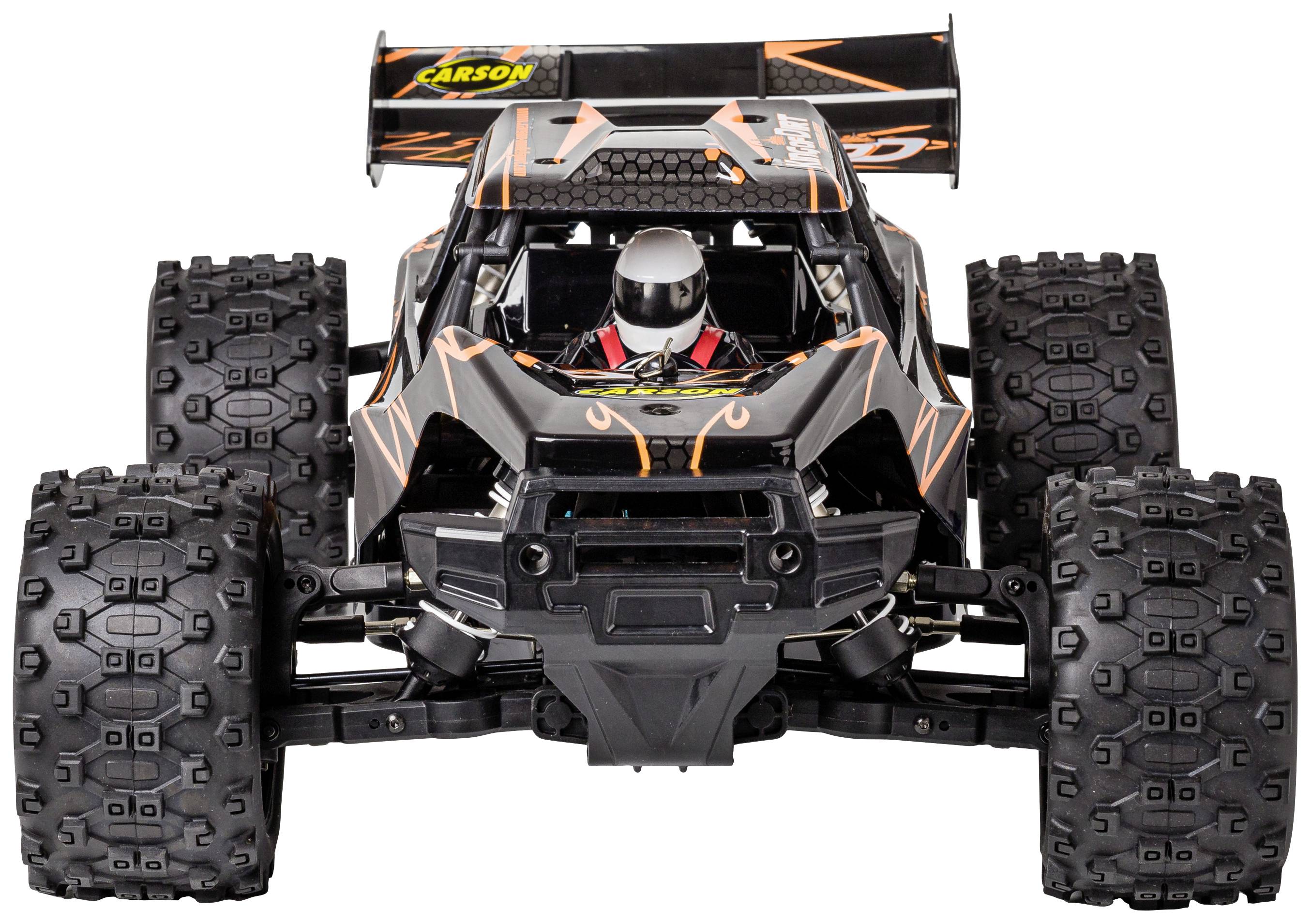 Remote-controlled model car in black with orange accents, wide tyres and a spoiler, photographed from the front.