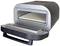 A compact electric pizza oven with an open lid, revealing its interior. Ideal for small kitchens and quick cooking.