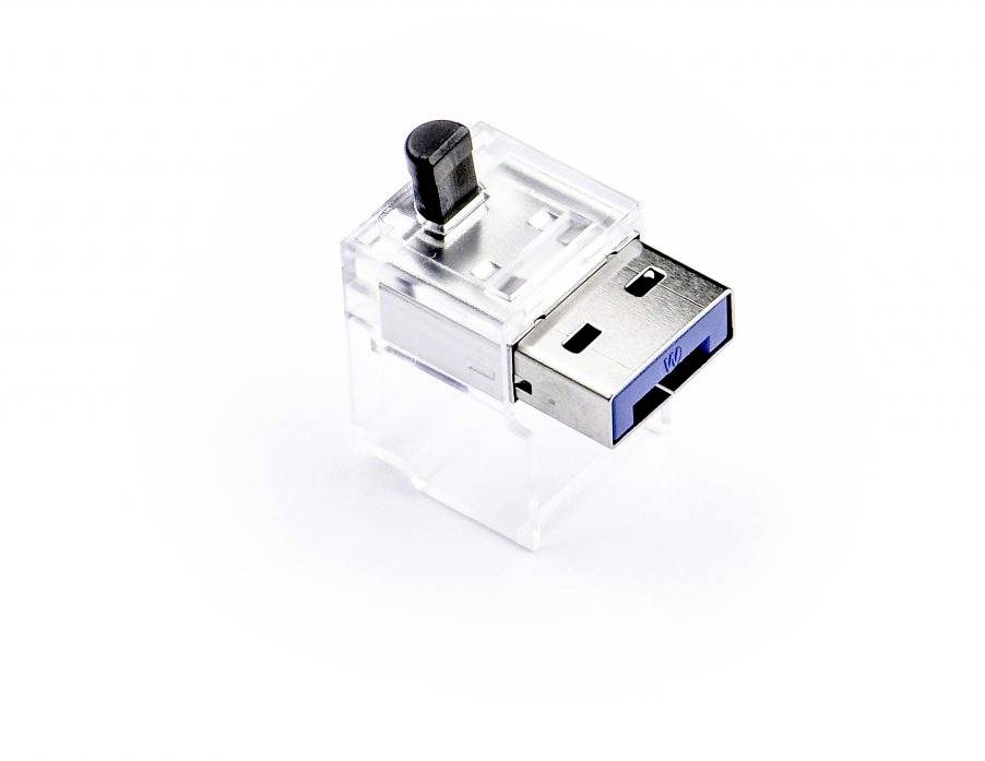 A transparent USB drive with a black sliding switch, isolated on a white background.