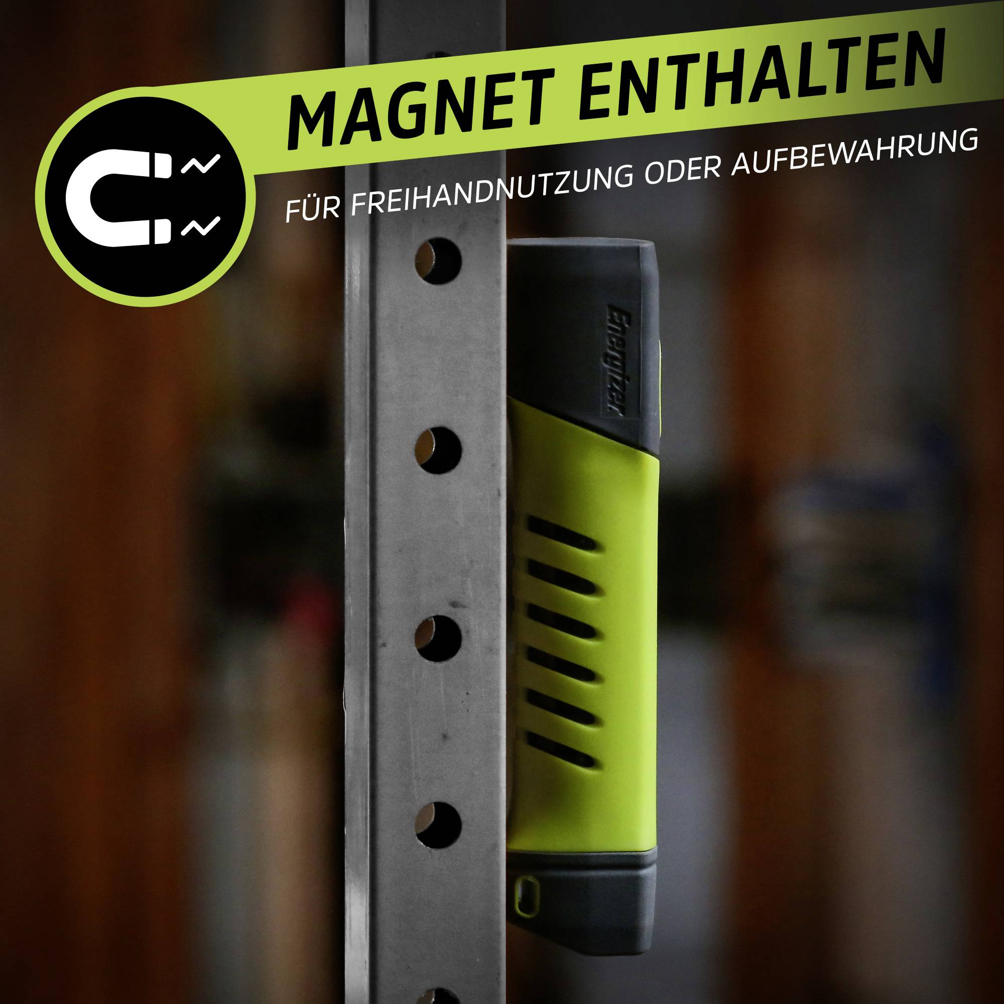 'Contains magnet' is displayed on a green banner. A device is magnetically attached to a metal surface. Text below: 'For hands-free use or storage'.