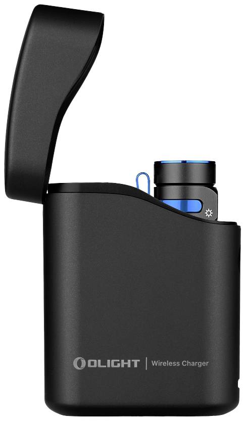 A black wireless charging box with an open lid reveals a small, cylindrical device inside.