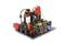 Industrial model installation with wired components and display, showing automated processes and control technology.