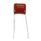 A red ceramic capacitor with two wire leads. The inscription on top reads '2E224K'.