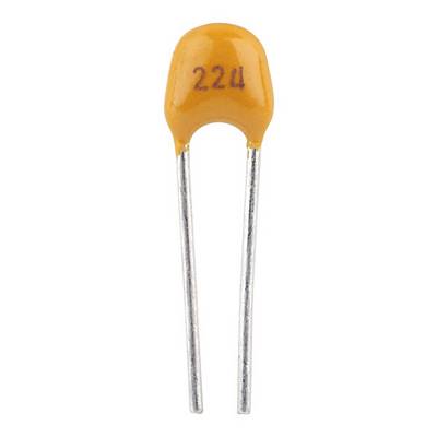 A yellow ceramic capacitor marked with '22μ'.