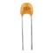 An orange ceramic capacitor labelled '104' with two metal terminals protruding downwards.