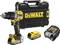 A yellow cordless drill with accessories and a black carry case. The brand name 'DEWALT' visible on the case and device.