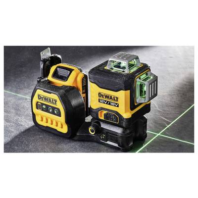DeWalt cross-line laser on a table, showing green laser lines. The device is black and yellow and suitable for precise measurement work.