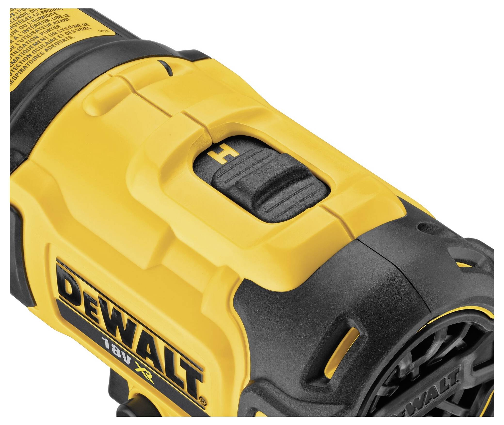 Close-up of a yellow power drill with a black switch and logo lettering. The brand name 'DEWALT' is visible.