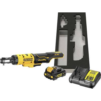 Precise model in yellow and black with charger and battery. In the background, a black foam case with cutouts for the components.