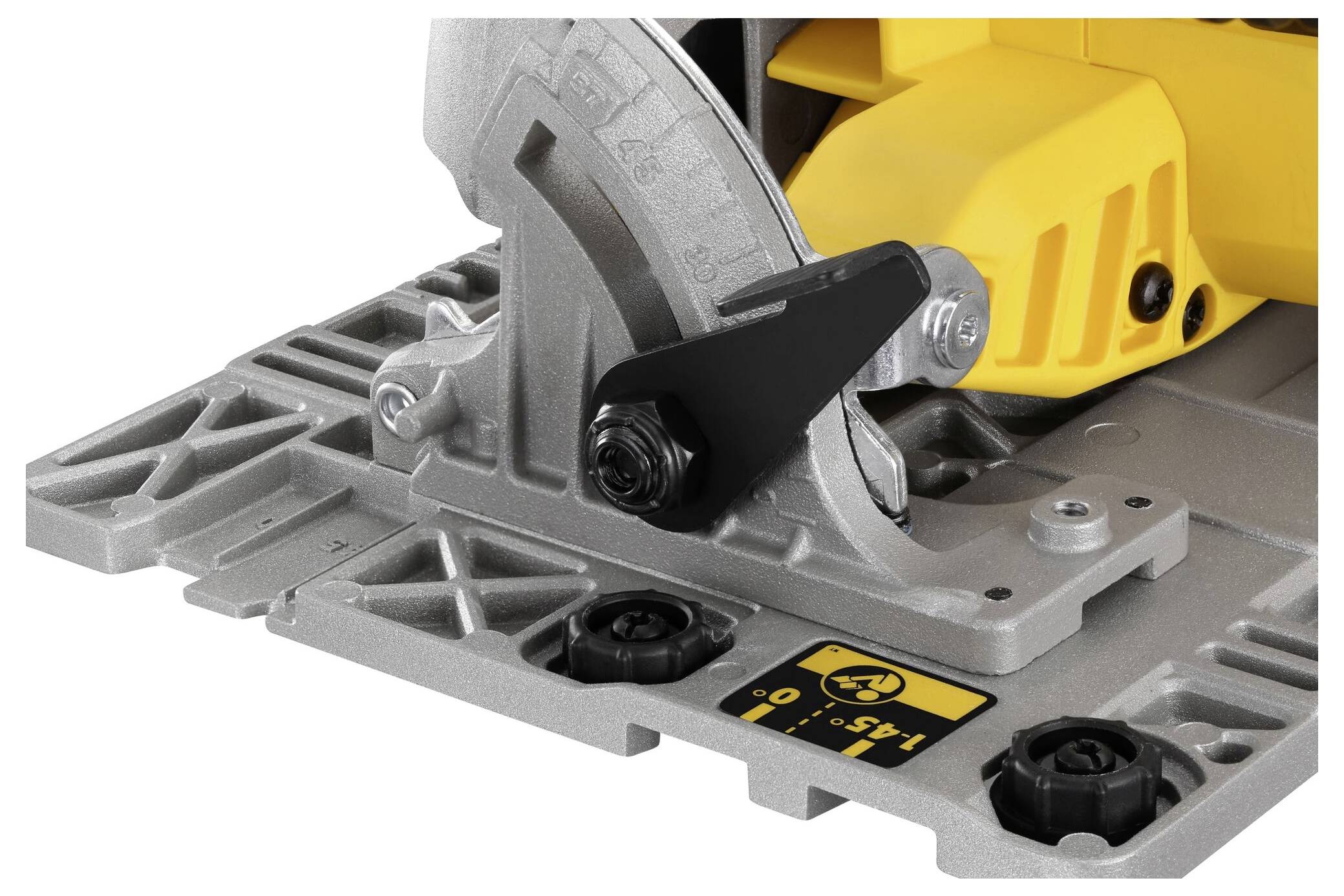 Close-up of a yellow circular saw with a silver casing. Focused on the base and depth adjustment of the saw.