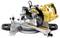 A yellow and black mitre saw on a table. It is used for precise angled cuts in wood or other materials.