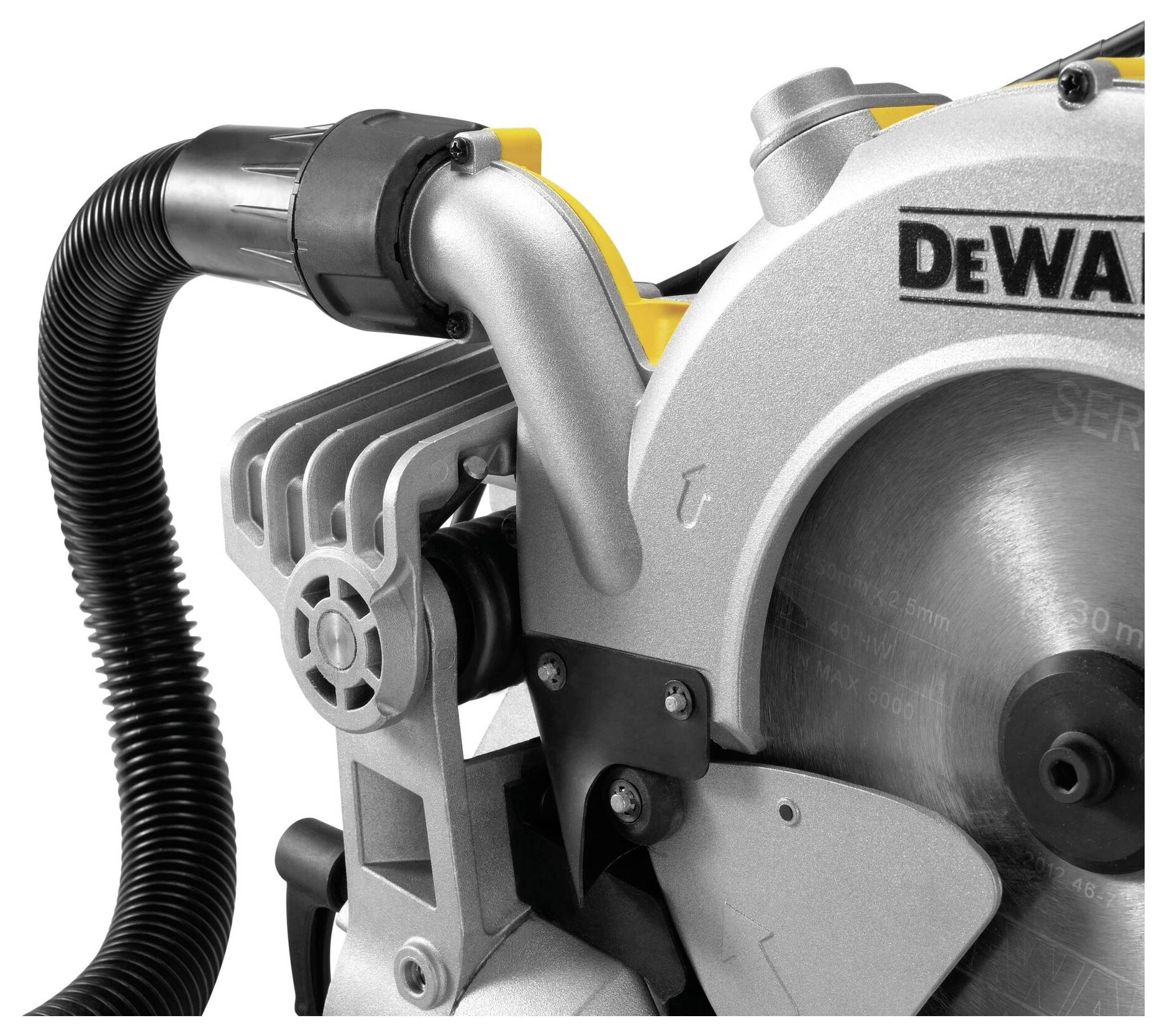 Circular saw with protective cover and attached dust extraction pipe from a well-known brand, close-up shot, focused on the saw blade.