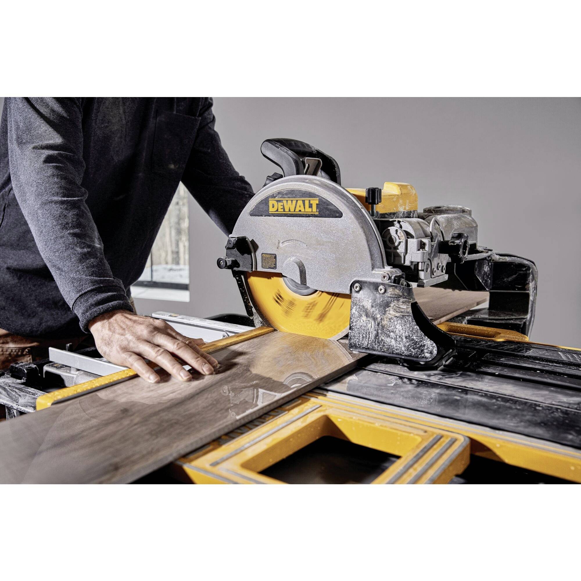 A craftsman is cutting a wooden board with a DeWalt circular saw. Safety and precision are the primary focus.