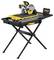 A yellow and black mitre saw on a folding stand, suitable for precise woodworking and metalworking.