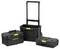 'Three black tool boxes of different sizes, some open, with yellow locks and Stanley logo. One has wheels and a handle.'