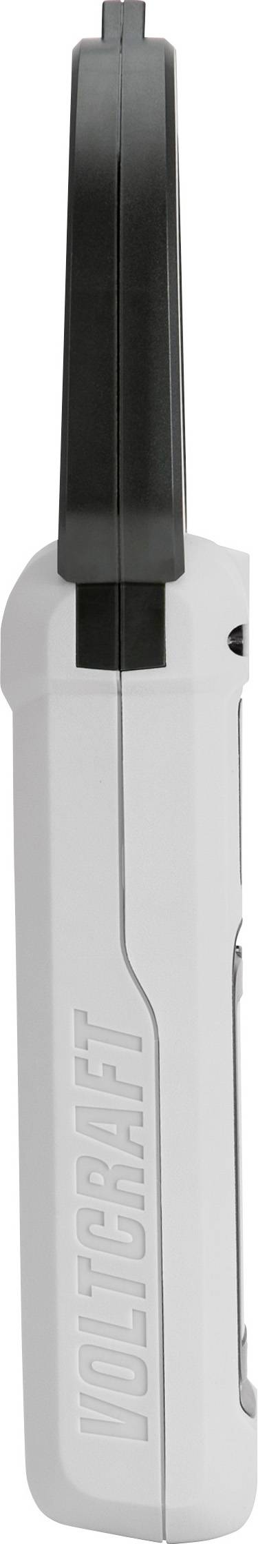 A side view of a white and black handheld device with the brand name 'Polaris' embossed on the side, possibly an electronic gadget.