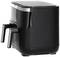A black air fryer with two drawers, suitable for simultaneously preparing different dishes.