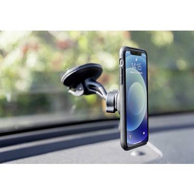 Smartphone mounted in a holder on a car's windscreen, with blurred trees in the background.