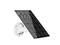 A black solar panel on a white wall mount, for utilising solar energy. Ideal for environmentally friendly applications.