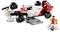 A LEGO model of a racing car with red and white details on a grey stand. Next to it stands a LEGO minifigure with a helmet.