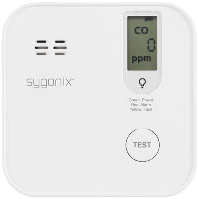 A carbon monoxide detector with a digital display shows '0 ppm'. Two indicator lights: Green for operation, Red for alarm. 'TEST' button.