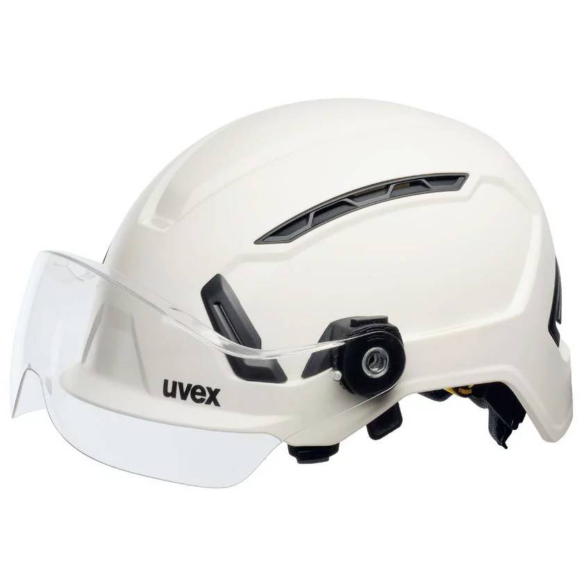 A white safety helmet with a visor, ventilation openings, and the 'uvex' logo. The helmet is used for protection in the workplace.