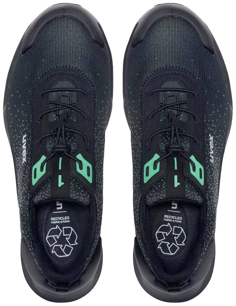 Black trainers viewed from above with green accents, made from recycled materials, designed with X.