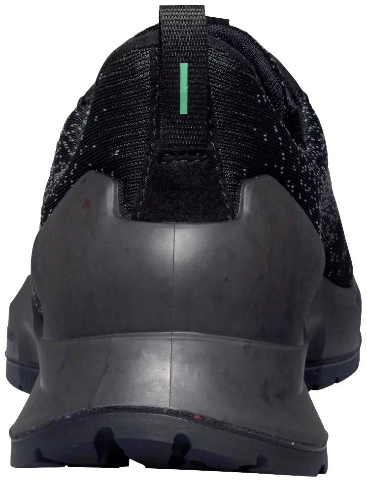 Black sports shoe from behind, showing the sole and heel section. Upper material made of textile with grey accents.