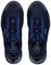 Two black shoes with blue details, viewed from above. A recycling symbol is on the inner sole. 'Uvex' brand on the side.