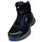 Black safety shoe with blue accents, robust design and uvex logo. Suitable for work deployments, offers protection and comfort.