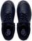 Black work shoes made with recycled material, viewed from above. Recycling symbols on the insoles emphasise sustainability.