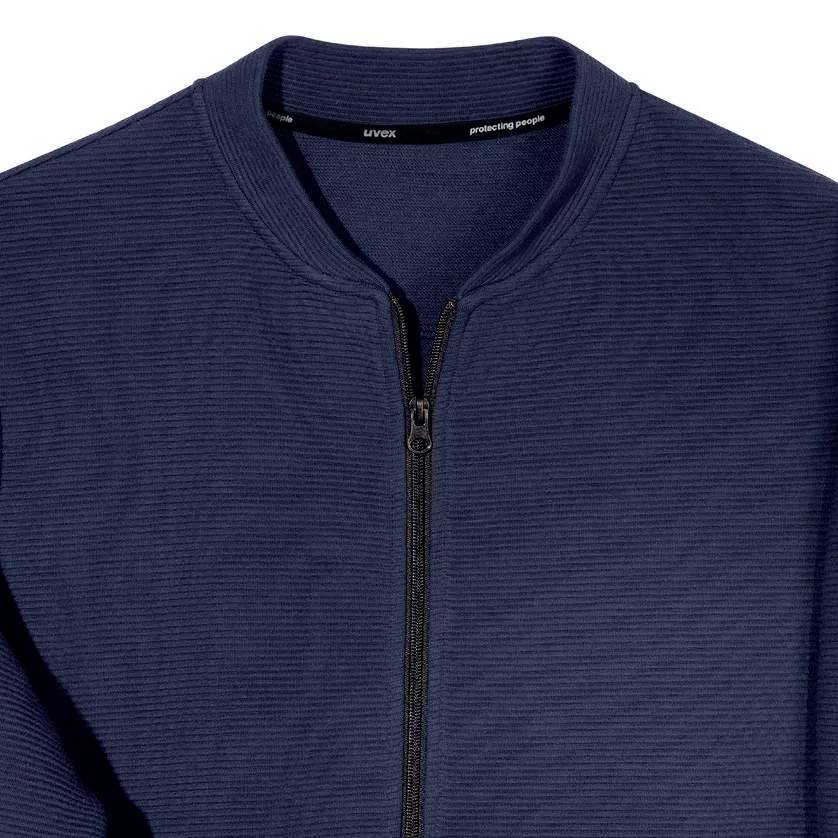 A navy blue zip-up jumper, visible in close-up without any discernible brand logos.