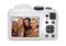 A camera back reveals a display showing a photograph of four smiling people. They appear cheerful and relaxed.