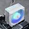 A white computer cooler with an illuminated blue fan is mounted on a motherboard, ready to cool the CPU.