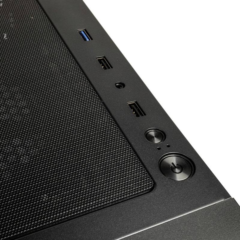 Computer case front panel with multiple USB ports, audio jack, and power switch. Textured surface visible.