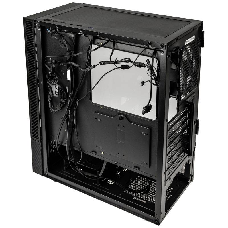 An open computer case without components, showing cable management and space for hardware parts such as motherboard and hard drives.