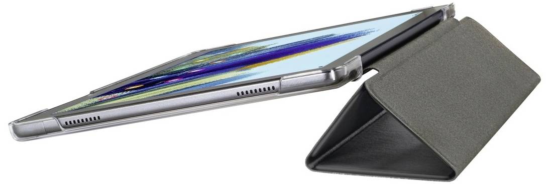 A tablet with its screen switched on is lying on a folded protective case that serves as a stand. The screen displays colourful graphics.