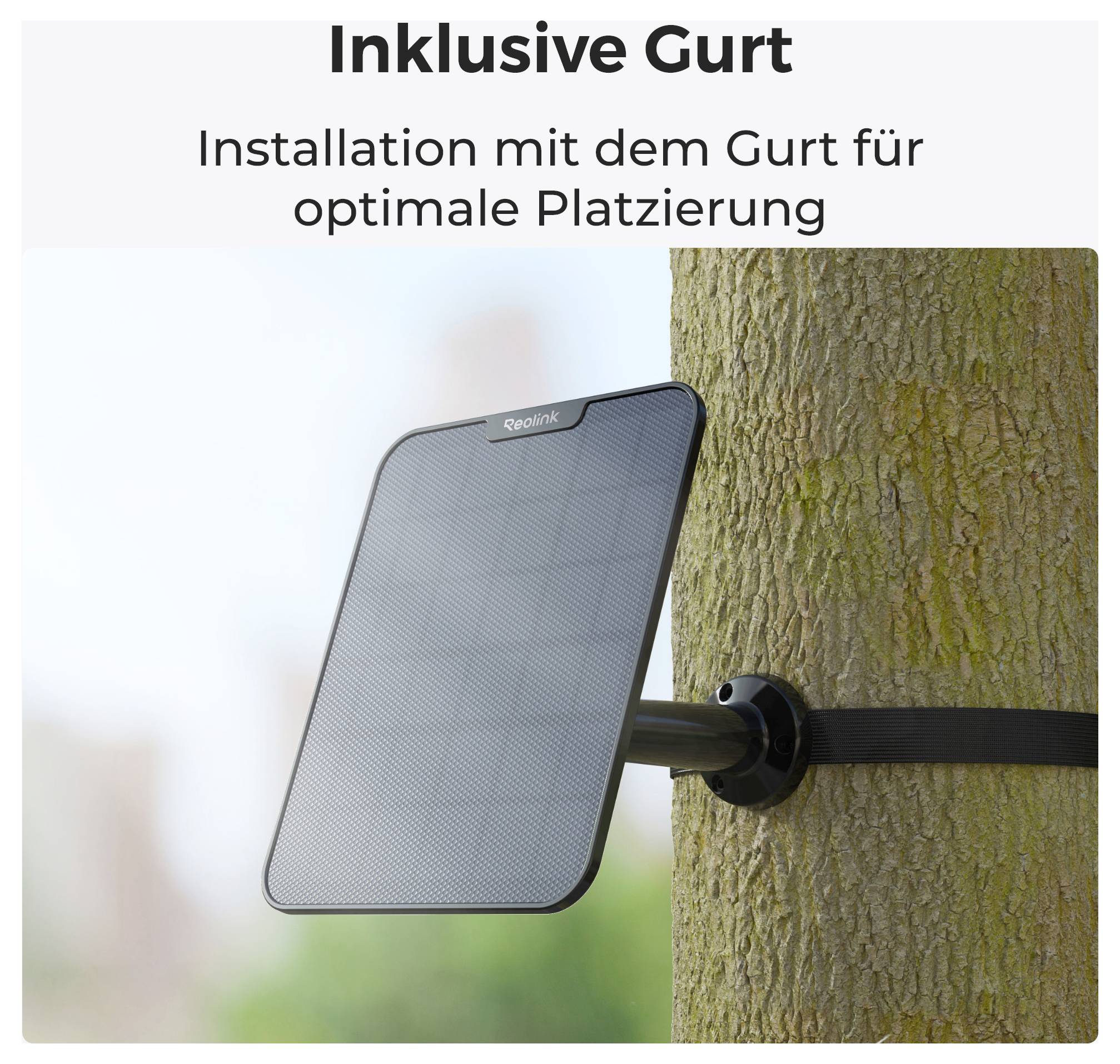 'Solar panel secured with a strap on a tree trunk. Text above: Includes strap. Installation with the strap for optimal placement.'
