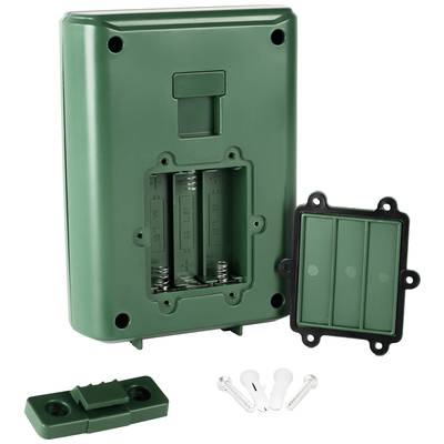 Green battery compartment housing with its lid removed, battery slots are visible. Screws and wall mount are positioned nearby.